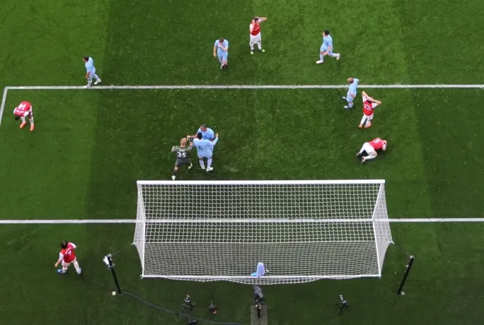 Framed Print : Arsenal's Frustration: Vermaelen and Benayoun Reaction after Missed Opportunities against Manchester City (2011-12)