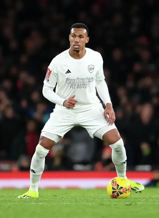 Framed Print : Arsenal's Gabriel Charges Forward in White: Emirates FA Cup Battle Against Liverpool