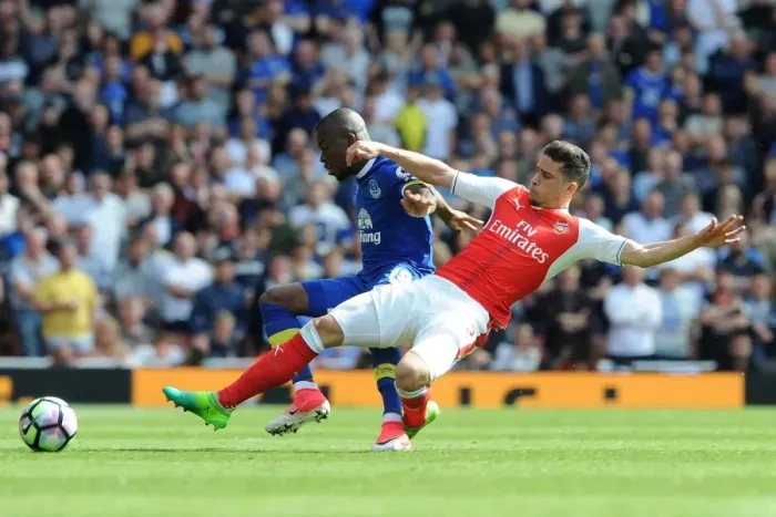 Framed Print : Arsenal's Gabriel Faces Off Against Everton's Enner Valencia in Intense Premier League Clash Framed Print : Arsenal's Gabriel Faces Off Against Everton's Enner Valencia in Intense Premier League Clash