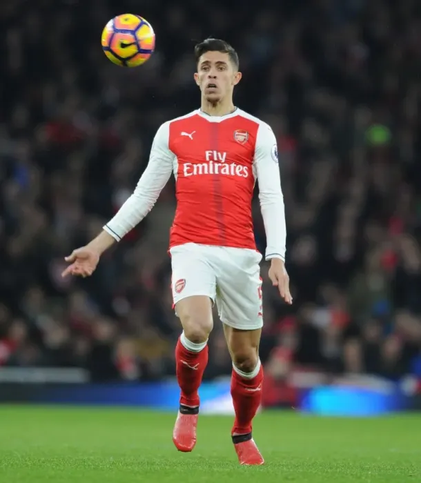 Framed Print : Arsenal's Gabriel Faces Off Against Stoke City in the Premier League