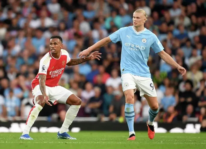 Framed Print : Arsenal's Gabriel Holds Off Manchester City's Haaland in Intense Premier League Clash (2023-24)