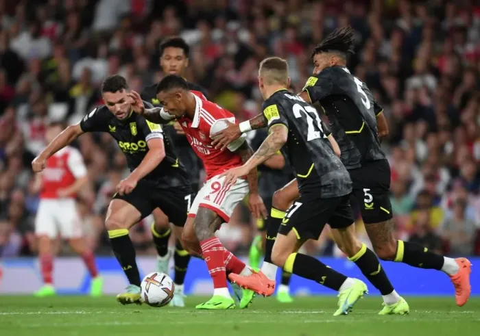 Framed Print : Arsenal's Gabriel Jesus Clashes with Mings and McGinn in Intense Aston Villa Showdown