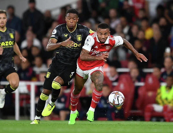 Arsenal's Gabriel Jesus Faces Off Against Aston Villa's Ezri Konsa in 2022-23 Premier League Clash