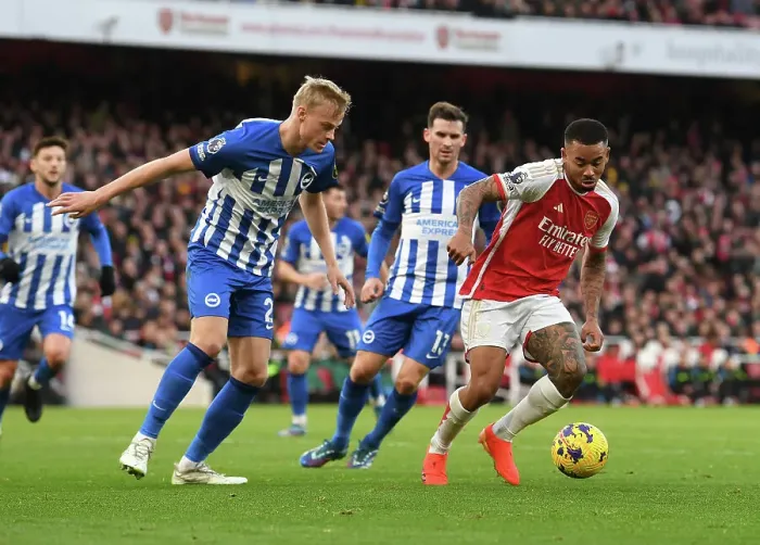 Framed Print : Arsenal's Gabriel Jesus Faces Off Against Brighton's Van Hecke in Premier League Clash (2023-24)