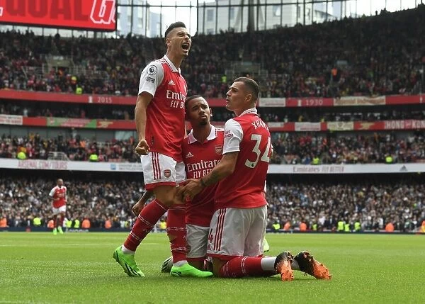 Arsenal's Gabriel Jesus and Martinelli Celebrate with Xhaka after Scoring against Tottenham in 2022-23 Premier League