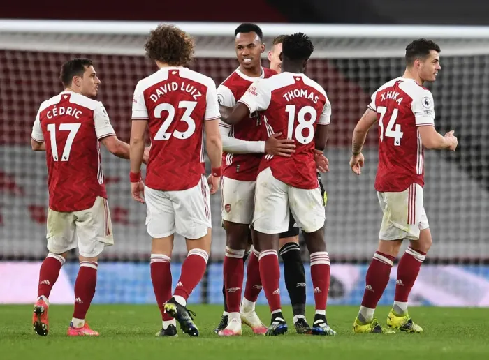 Framed Print : Arsenal's Gabriel Magalhaes Celebrates Victory Over Tottenham in the Premier League