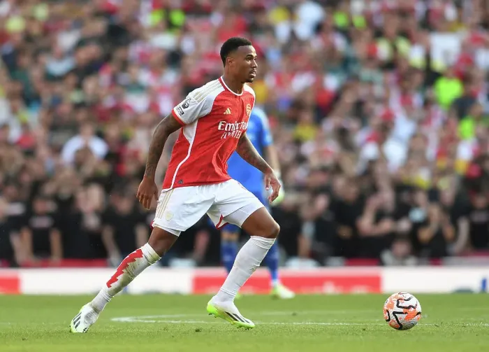 Framed Print : Arsenal's Gabriel Magalhaes Faces Off Against Manchester United in the Premier League (2023-24)