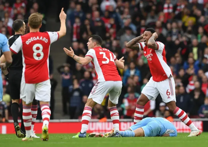Framed Print : Arsenal's Gabriel Magalhaes Receives Red Card in Intense Arsenal v Manchester City Clash (2021-22) Framed Print : Arsenal's Gabriel Magalhaes Receives Red Card in Intense Arsenal v Manchester City Clash (2021-22)