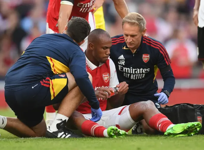 Framed Print : Arsenal's Gabriel Magalhaes Receives Treatment During Arsenal v Fulham Match, 2022-23 Premier League