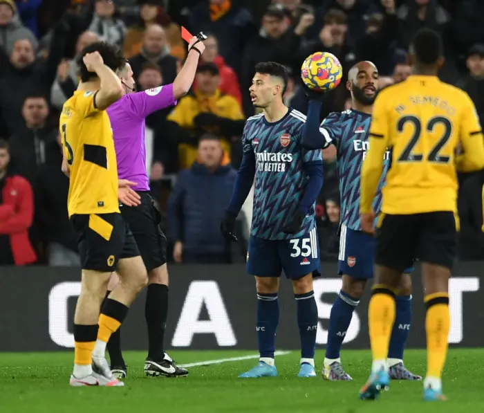 Framed Print : Arsenal's Gabriel Martinelli Receives Red Card in Wolverhampton Wanderers vs Arsenal Premier League Clash Framed Print : Arsenal's Gabriel Martinelli Receives Red Card in Wolverhampton Wanderers vs Arsenal Premier League Clash