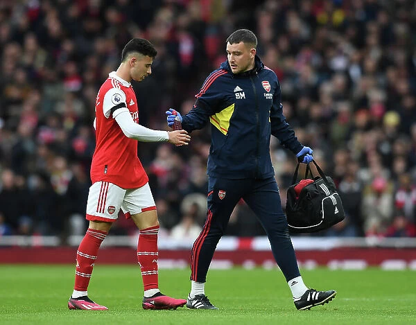 Arsenal's Gabriel Martinelli Receives Treatment from Physio during Arsenal v Brentford Match, Emirates Stadium, London, 2023
