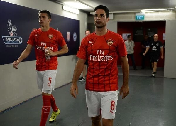Arsenal's Gabriel and Mikel Arteta: Pre-Match Moment at 2015 Asia Trophy Against Everton