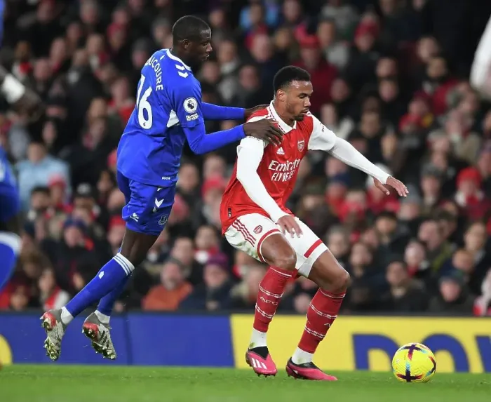 Framed Print : Arsenal's Gabriel Outmaneuvers Everton's Doucoure in Premier League Clash