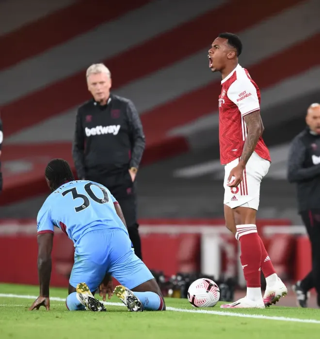 Framed Print : Arsenal's Gabriel Protests Referee's Call Against West Ham's Antonio (2020-21)
