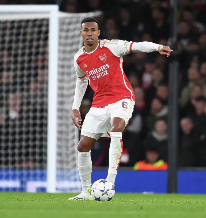 Framed Print : Arsenal's Gabriel Stands Firm Against Sevilla in UEFA Champions League Clash Framed Print : Arsenal's Gabriel Stands Firm Against Sevilla in UEFA Champions League Clash