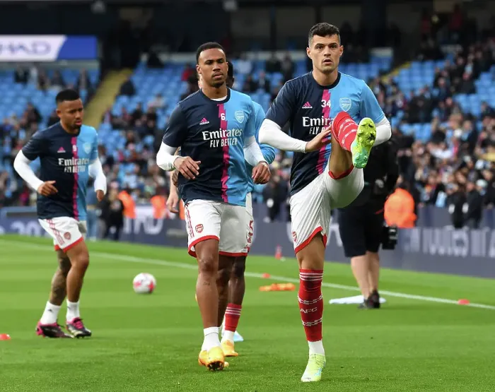 Framed Print : Arsenal's Gabriel and Xhaka Warm Up Ahead of Manchester City Showdown - Premier League 2022-23