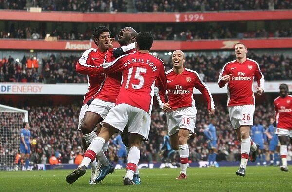Arsenal's Gallas and Teamsmates Celebrate 1:0 Victory Over Portsmouth