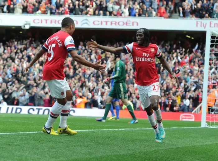 Framed Print : Arsenal's Gervinho and Oxlade-Chamberlain Celebrate Goal Against Chelsea (2012-13) Framed Print : Arsenal's Gervinho and Oxlade-Chamberlain Celebrate Goal Against Chelsea (2012-13)