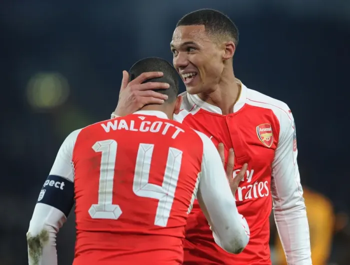 Framed Print : Arsenal's Gibbs and Walcott in Action: FA Cup Clash Against Hull City