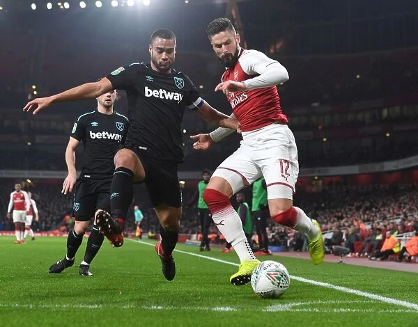 Arsenal's Giroud Clashes with West Ham's Reid in Carabao Cup Quarterfinal