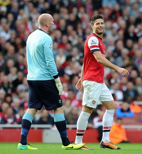 Arsenal's Giroud Engages Norwich's Ruddy During Premier League Clash