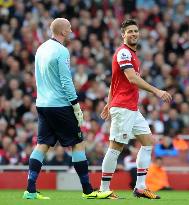 Framed Print : Arsenal's Giroud Engages Norwich's Ruddy During Premier League Clash Framed Print : Arsenal's Giroud Engages Norwich's Ruddy During Premier League Clash
