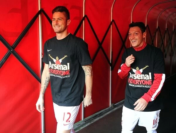 Arsenal's Giroud and Ozil Unite in Arsenal For Everyone T-Shirts (Arsenal v Southampton, 2013-14)