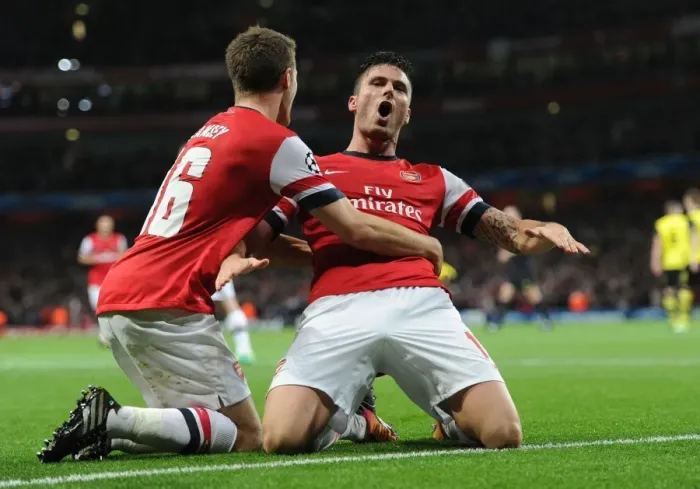 Framed Print : Arsenal's Giroud and Ramsey: Celebrating a Goal Against Borussia Dortmund in the 2013-14 UEFA Champions League Framed Print : Arsenal's Giroud and Ramsey: Celebrating a Goal Against Borussia Dortmund in the 2013-14 UEFA Champions League
