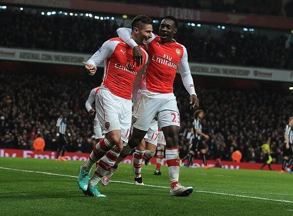 Arsenal's Giroud and Welbeck Celebrate Goals Against Newcastle United (2014 / 15)