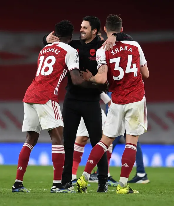 Framed Print : Arsenal's Glory: Arteta Celebrates with Partey and Xhaka after Beating Tottenham