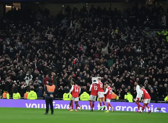 Framed Print : Arsenal's Glory: Celebrating a Hard-Fought Premier League Victory over Tottenham Hotspur in London