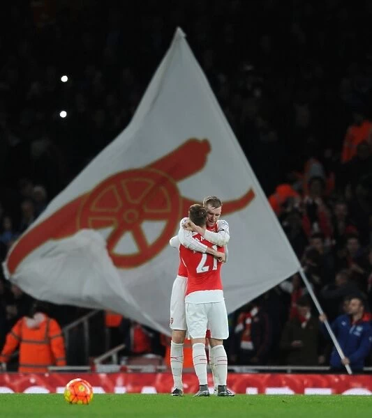 Arsenal's Glory: Per Mertesacker and Aaron Ramsey Celebrate Hard-Fought Victory Over Manchester City (2015-16 Premier League)