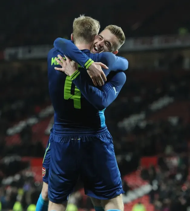 Framed Print : Arsenal's Glory: Mertesacker and Chambers Celebrate FA Cup Quarterfinal Victory over Manchester United Framed Print : Arsenal's Glory: Mertesacker and Chambers Celebrate FA Cup Quarterfinal Victory over Manchester United