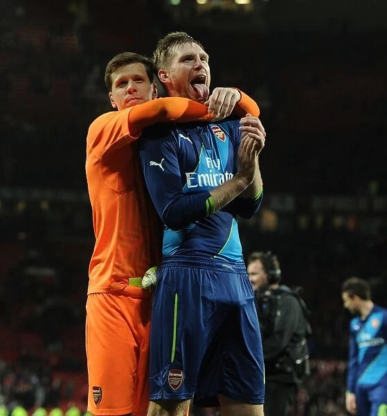 Arsenal's Glory: Mertesacker and Szczesny Celebrate FA Cup Quarterfinal Victory over Manchester United at Old Trafford
