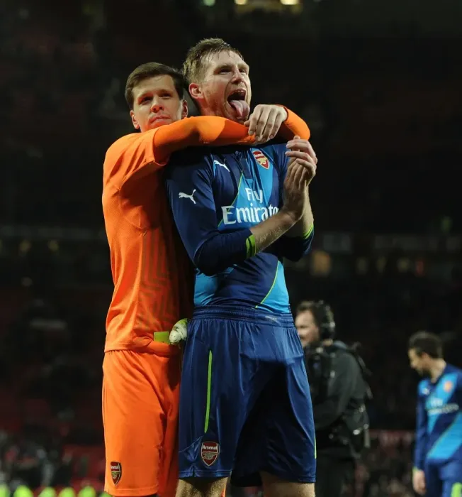 Framed Print : Arsenal's Glory: Mertesacker and Szczesny Celebrate FA Cup Quarterfinal Victory over Manchester United at Old Trafford Framed Print : Arsenal's Glory: Mertesacker and Szczesny Celebrate FA Cup Quarterfinal Victory over Manchester United at Old Trafford