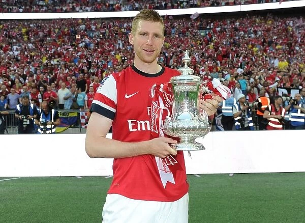 Arsenal's Glory: Per Mertesacker's FA Cup Victory Celebration (2014)