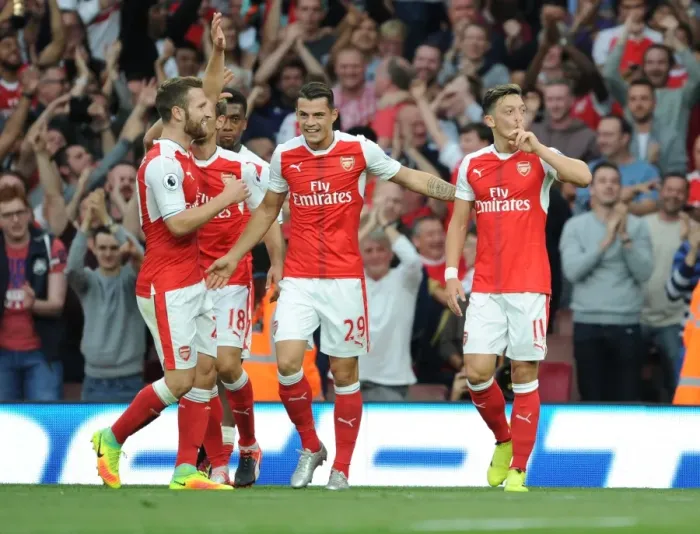 Framed Print : Arsenal's Glory: Ozil, Mustafi, Xhaka Celebrate Goals Against Chelsea (2016-17) Framed Print : Arsenal's Glory: Ozil, Mustafi, Xhaka Celebrate Goals Against Chelsea (2016-17)