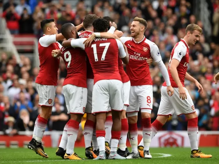 Framed Print : Arsenal's Goal Celebration: Monreal, Iwobi, Mustafi, Ramsey, Lacazette (vs Brighton & Hove Albion, 2017-18)