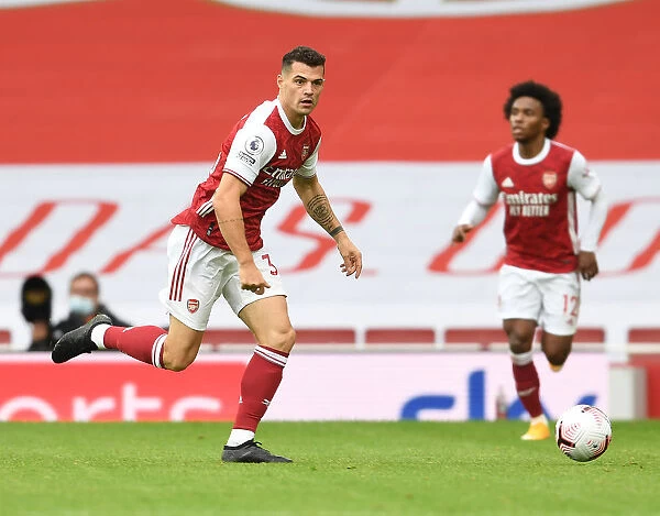 Arsenal's Granit Xhaka in Action: 2020-21 Premier League Match Against Sheffield United (Behind Closed Doors)