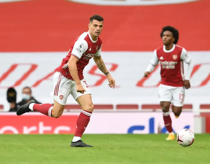 Framed Print : Arsenal's Granit Xhaka in Action: 2020-21 Premier League Match Against Sheffield United (Behind Closed Doors) Framed Print : Arsenal's Granit Xhaka in Action: 2020-21 Premier League Match Against Sheffield United (Behind Closed Doors)