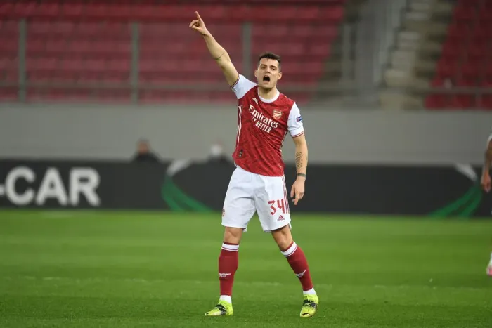 Framed Print : Arsenal's Granit Xhaka in Action Against SL Benfica in UEFA Europa League Round of 32 Framed Print : Arsenal's Granit Xhaka in Action Against SL Benfica in UEFA Europa League Round of 32