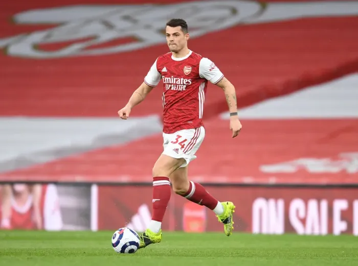 Framed Print : Arsenal's Granit Xhaka in Action Against Tottenham Amid Empty Emirates Stadium (Arsenal v Tottenham 2021)