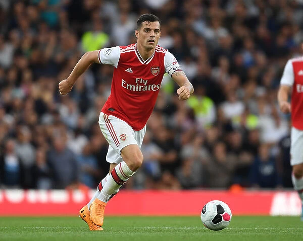 Arsenal's Granit Xhaka in Action Against Tottenhotspur in the 2019-20 Premier League