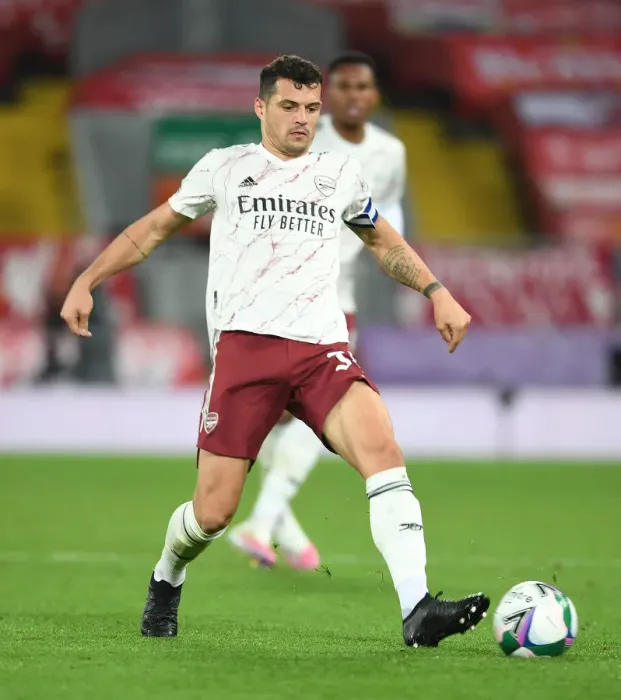 Framed Print : Arsenal's Granit Xhaka at Empty Anfield: Carabao Cup Clash vs. Liverpool, 2020