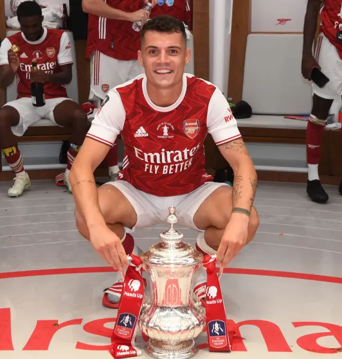 Framed Print : Arsenal's Granit Xhaka Celebrates FA Cup Victory: Arsenal v Chelsea, FA Cup Final 2020 (Empty Wembley Stadium)