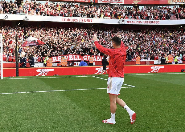 Arsenal's Granit Xhaka Celebrates Premier League Victory with Adoring Fans