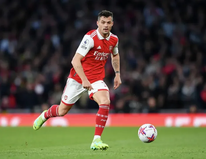 Framed Print : Arsenal's Granit Xhaka Charges Forward in Arsenal FC vs Chelsea FC Premier League Clash (2022-23)