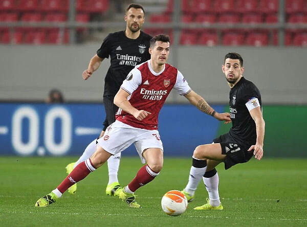 Arsenal's Granit Xhaka Clashes with Benfica's Pizzi in Europa League Showdown