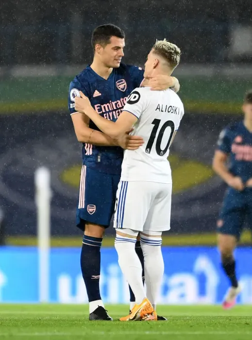Framed Print : Arsenal's Granit Xhaka Embraces Ezgjan Alioski of Leeds United - Premier League Clash, November 2020