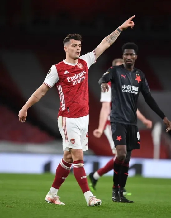 Framed Print : Arsenal's Granit Xhaka in Empty Emirates: UEFA Europa League Quarterfinal vs Slavia Praha